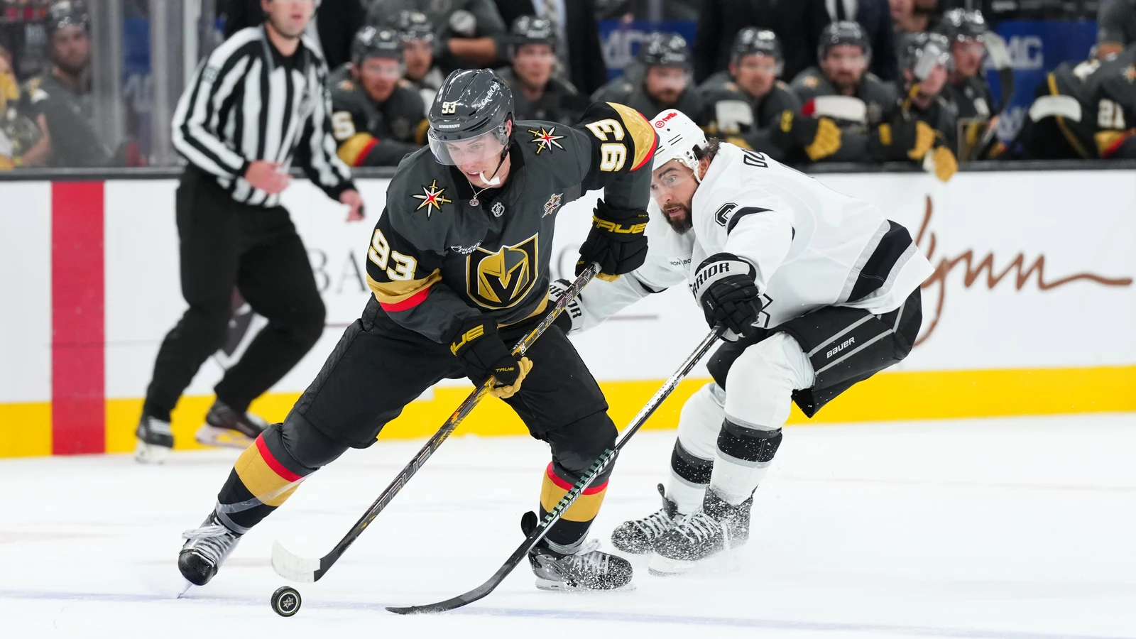 Mitch Marner skates with the puck against Drew Doughty during overtime at T-Mobile Arena.