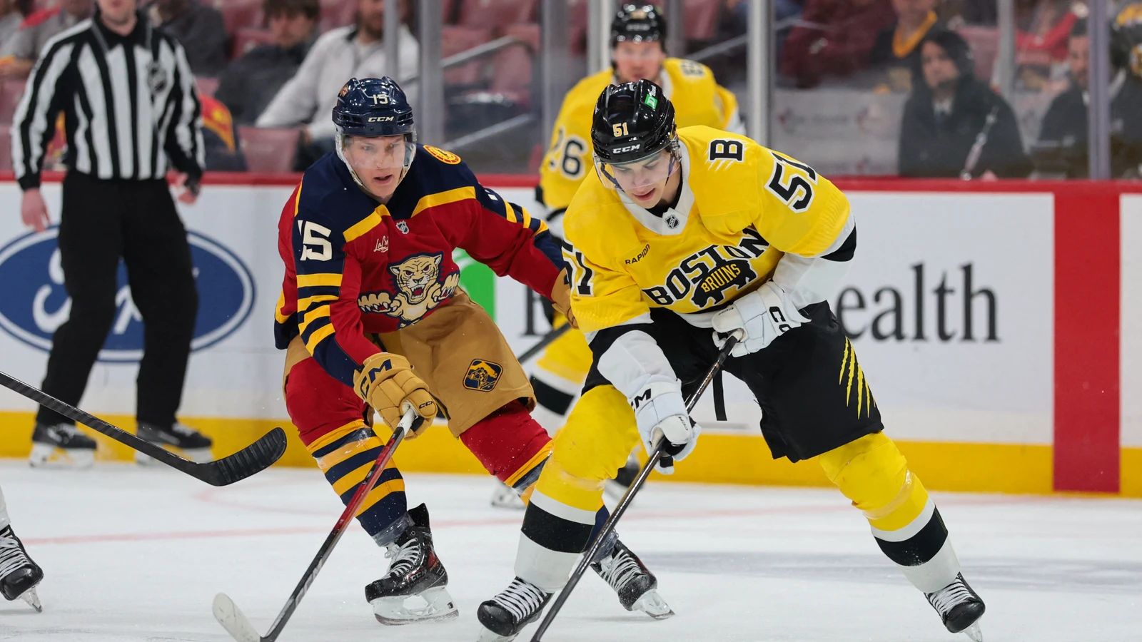 Matt Poitras carries the puck for Boston against Florida in February 2026. File photo.