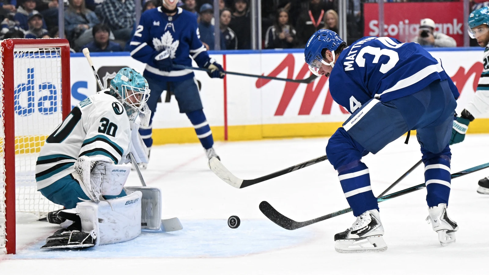 Auston Matthews shoots against San Jose Sharks goaltender Yaroslav Askarov at Scotiabank Arena.