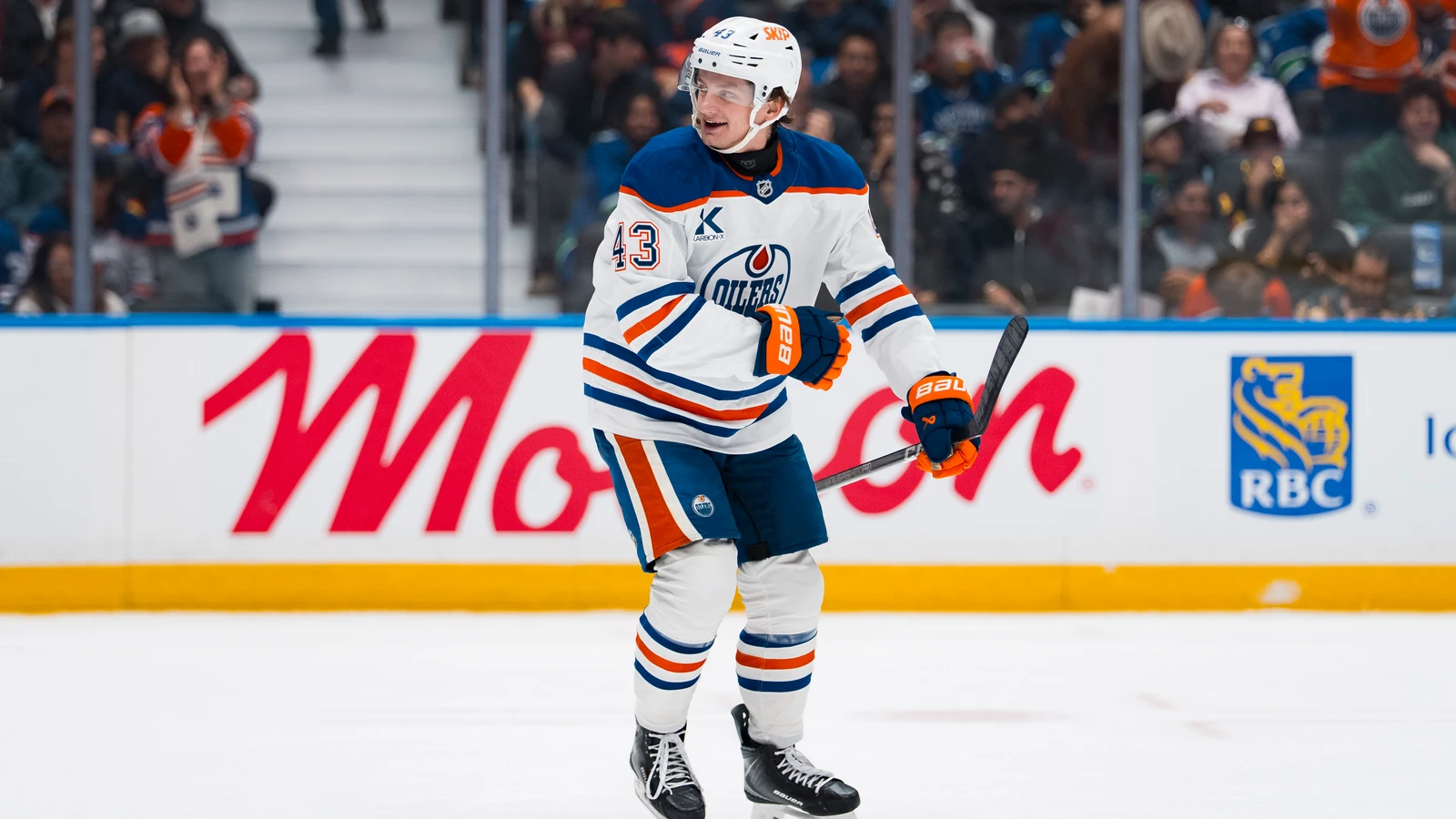 Owen Michaels celebrates his first NHL goal for the Edmonton Oilers at Rogers Arena in Vancouver.