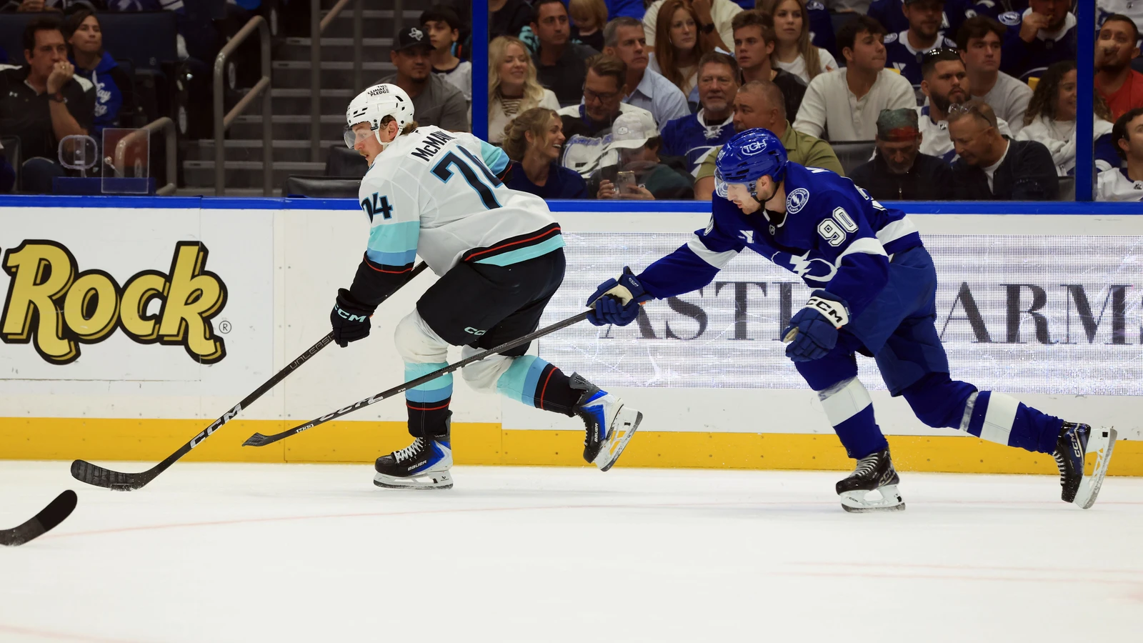 File photo: Seattle Kraken forward Bobby McMann carries the puck as Tampa Bay Lightning defenceman J.J. Moser defends.