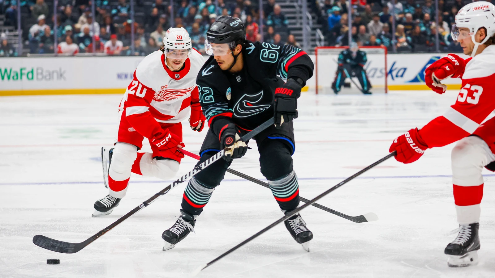 Seattle Kraken defenceman Brandon Montour skates with the puck against the Detroit Red Wings.
