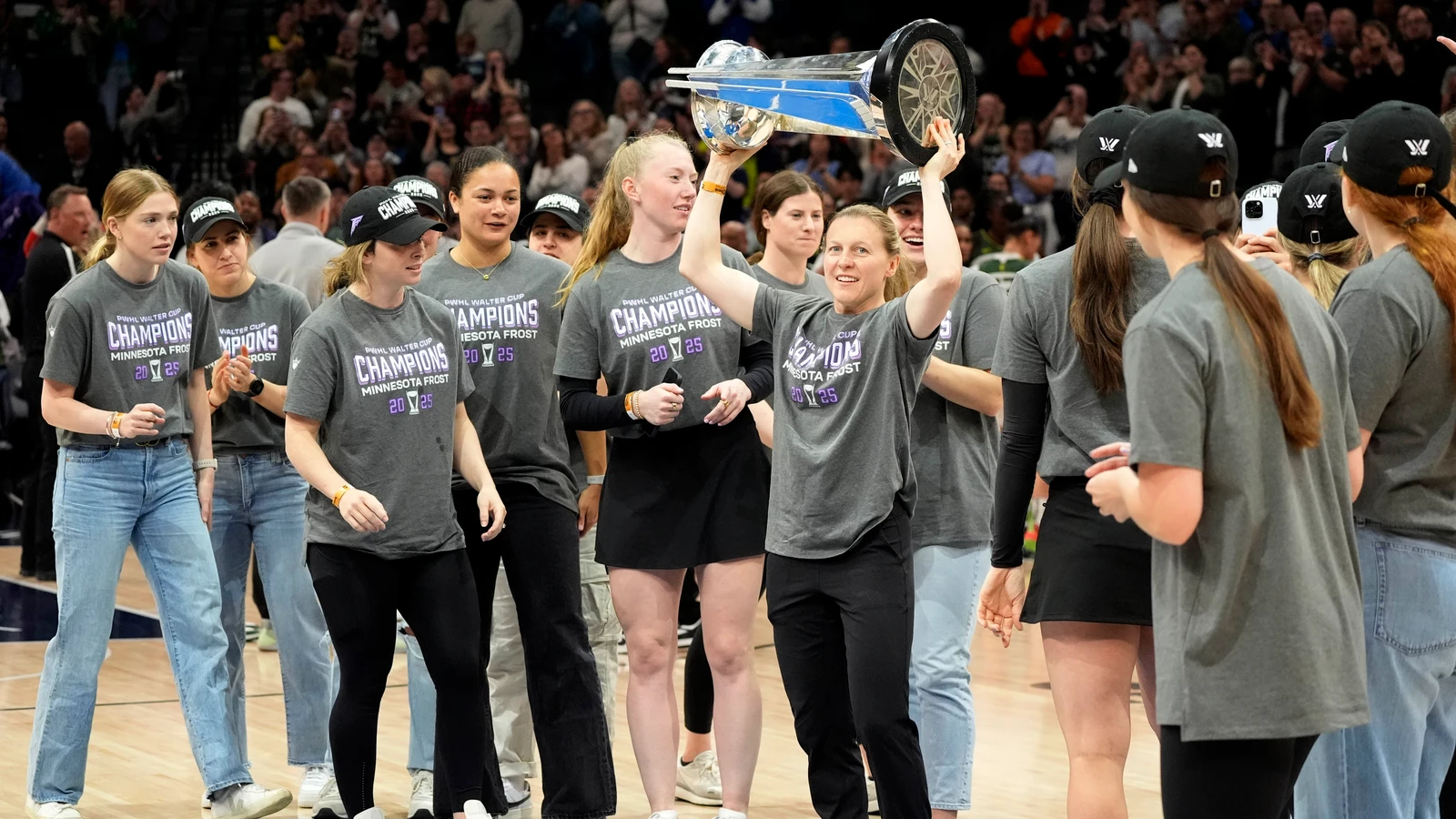 Minnesota Frost players carry the Walter Cup during a presentation at Target Center on May 27, 2025. File photo.