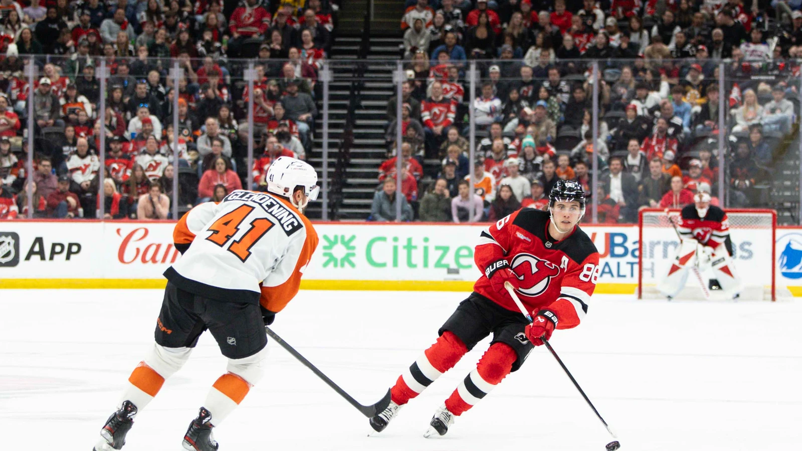 New Jersey Devils center Jack Hughes skates with the puck against the Philadelphia Flyers on April 7, 2026. File photo.