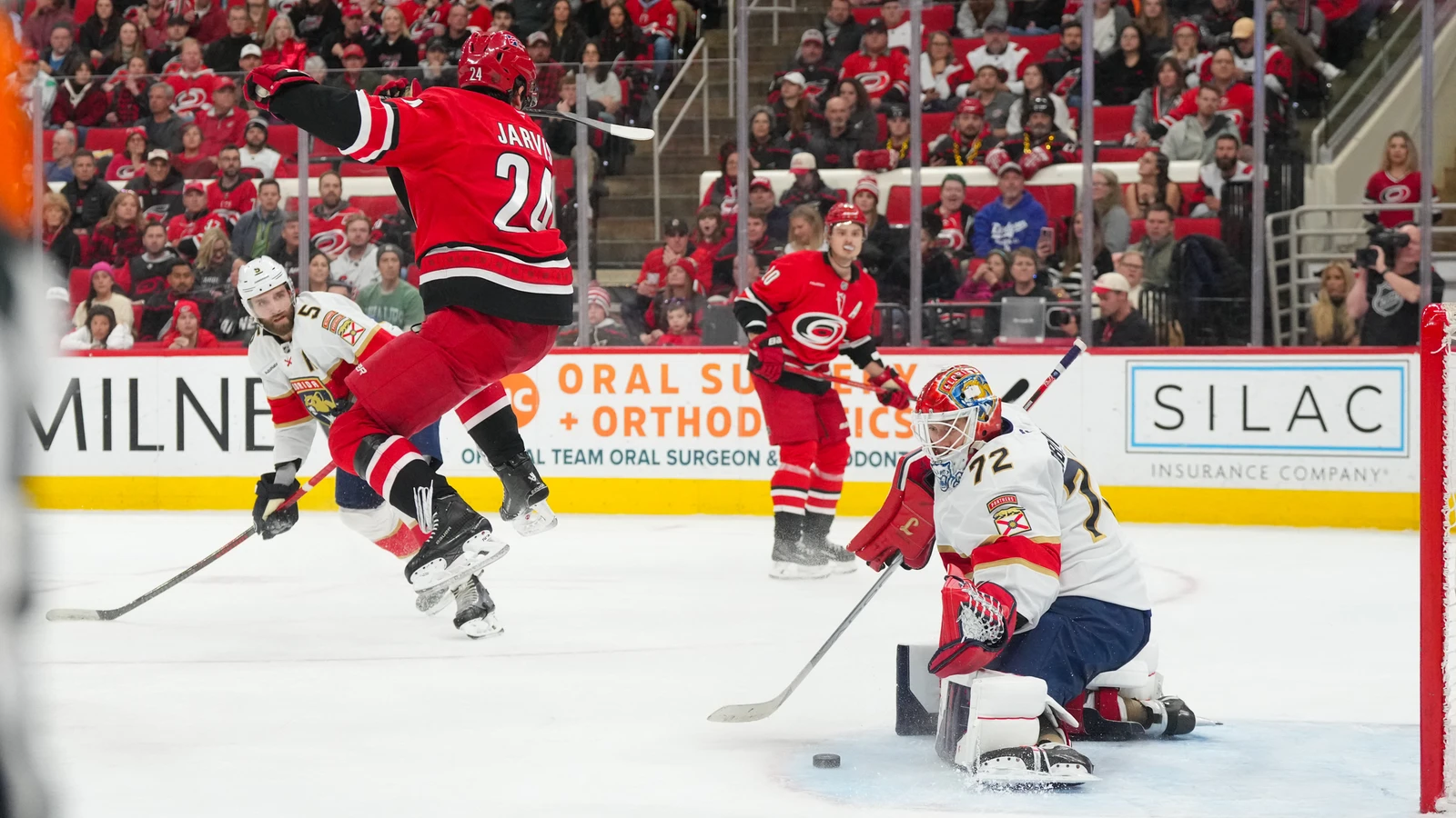 Seth Jarvis jumps in front of Sergei Bobrovsky during Carolina's game against Florida at Lenovo Center on January 16, 2026. File photo.