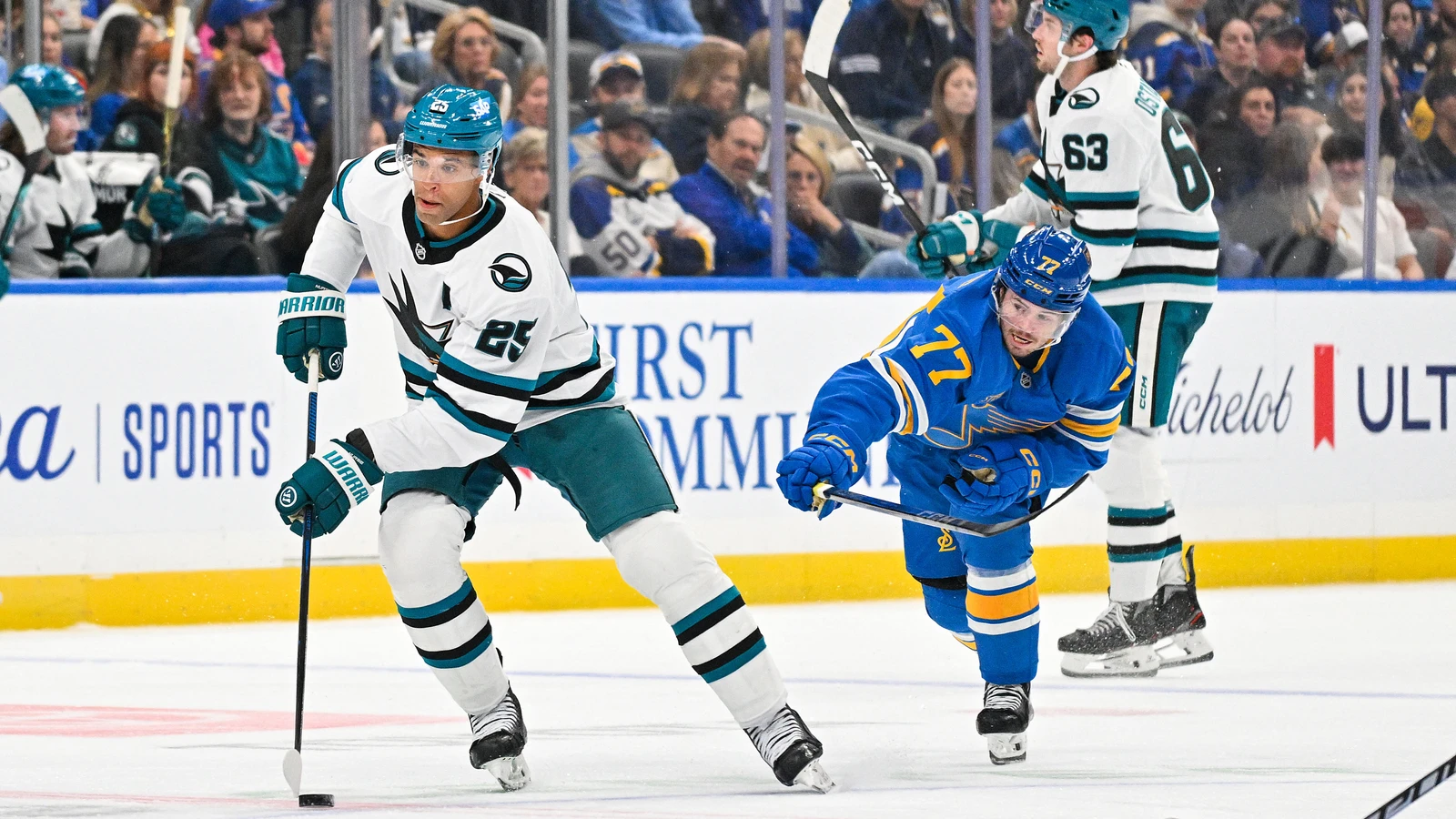 Darnell Nurse controls the puck for the San Jose Sharks against the St. Louis Blues at Enterprise Center.