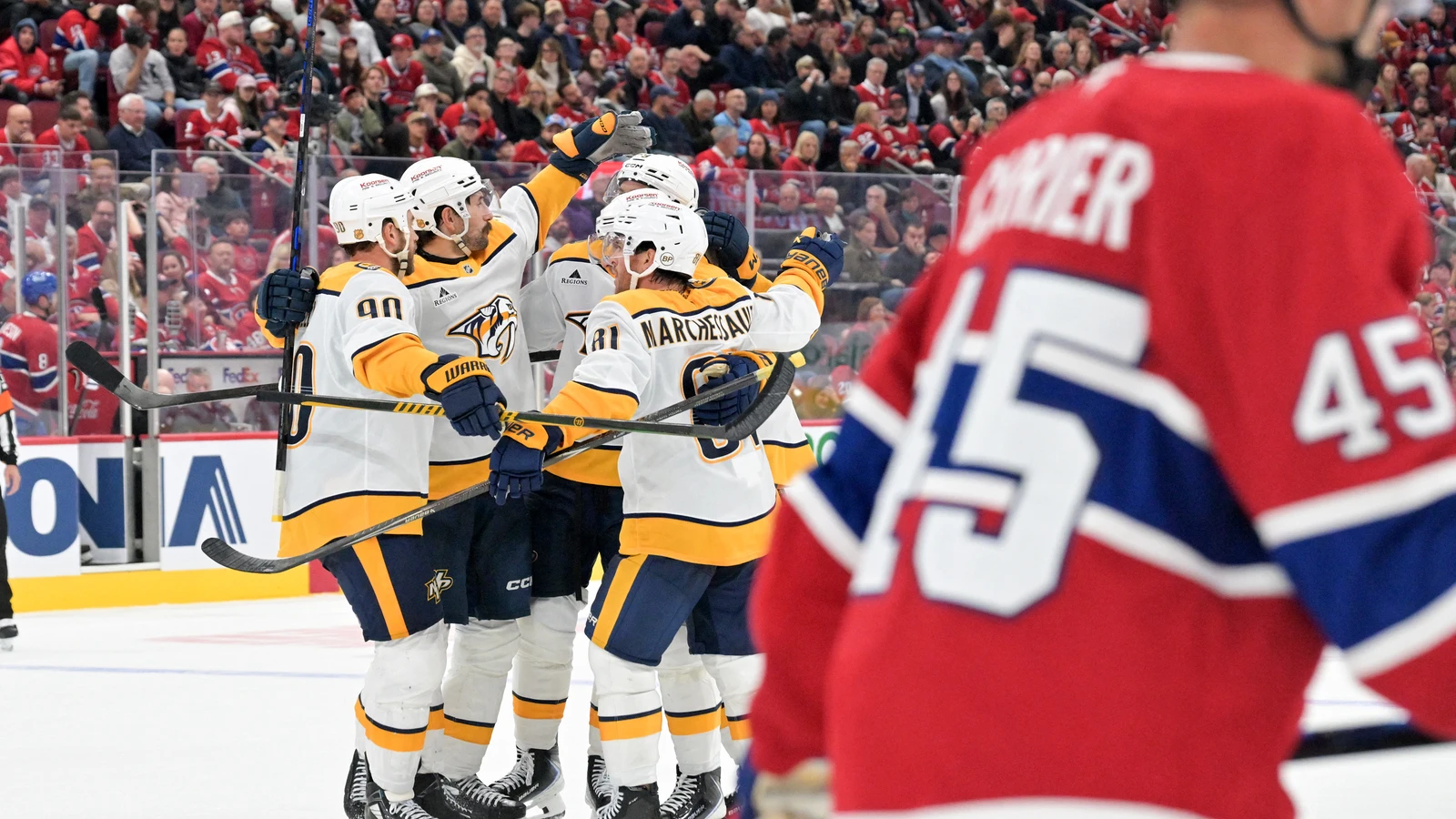 Ryan O'Reilly celebrates with Nashville Predators teammates after scoring against the Montreal Canadiens at Bell Centre.