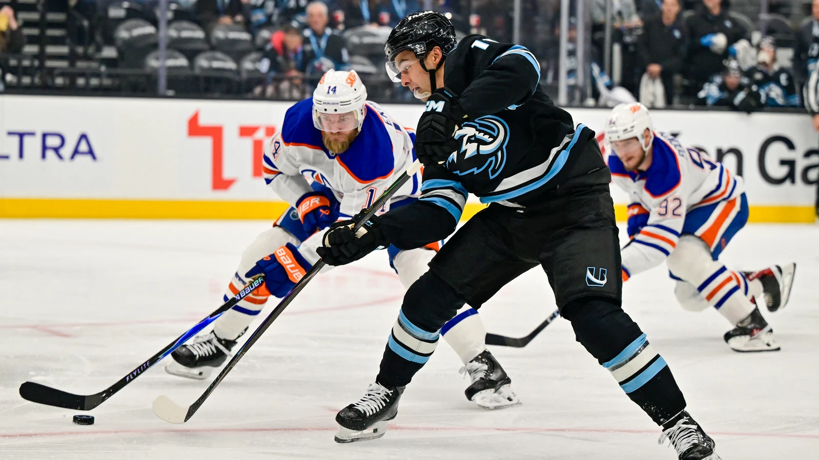 File photo: Edmonton Oilers defenceman Mattias Ekholm tries to block a shot by Utah Mammoth forward Dylan Guenther.