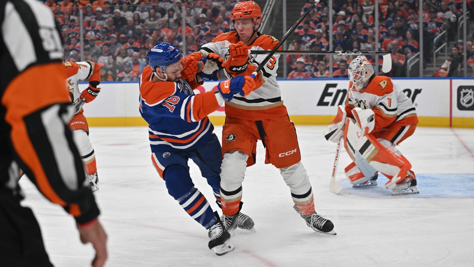 File photo: Edmonton Oilers centre Jason Dickinson collides with Anaheim Ducks defenceman Ian Moore during an April 20, 2026 playoff game in Edmonton.