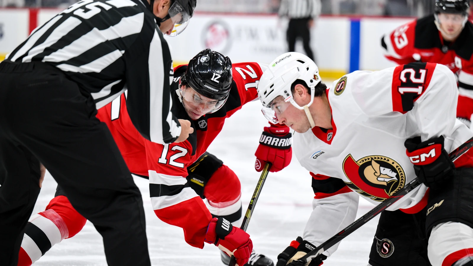 New Jersey Devils centre Cody Glass takes a faceoff against Ottawa at Prudential Center.