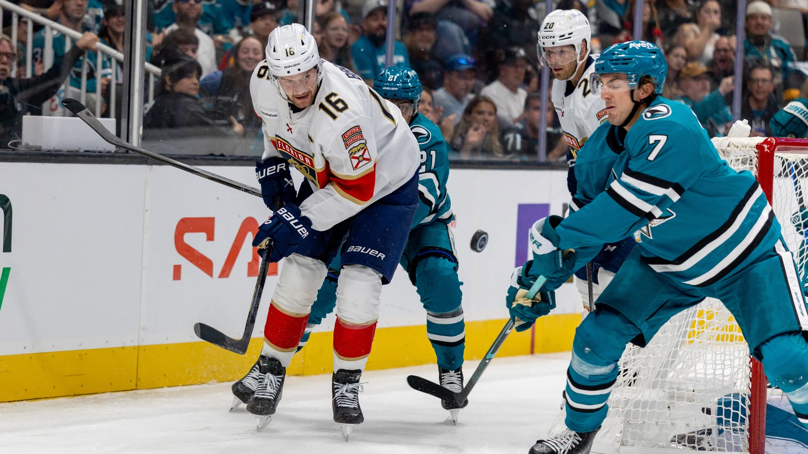 File photo: Florida Panthers centre Aleksander Barkov passes the puck beside San Jose Sharks defenceman Michael Kesselring.