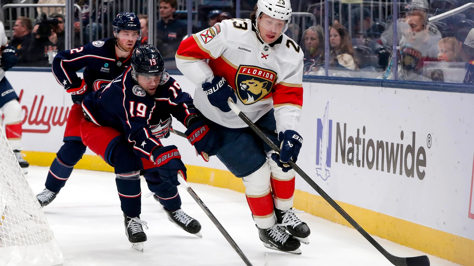 File photo: Panthers center Carter Verhaeghe grabs a loose puck against the Blue Jackets at Nationwide Arena in Columbus.
