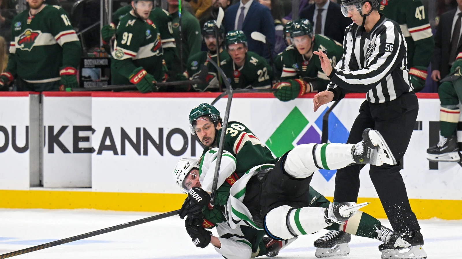 Nathan Bastian battles Mats Zuccarello during a Stars-Wild game in March 2026.