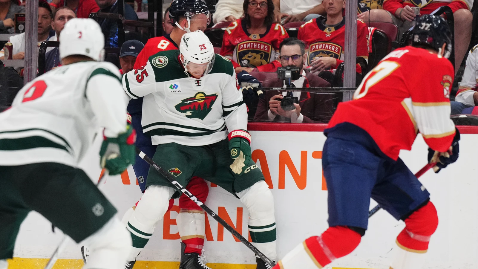 File photo: Florida Panthers forward Brady Tkachuk battles with Minnesota Wild defenceman Jonas Brodin for the puck at Amerant Bank Arena.
