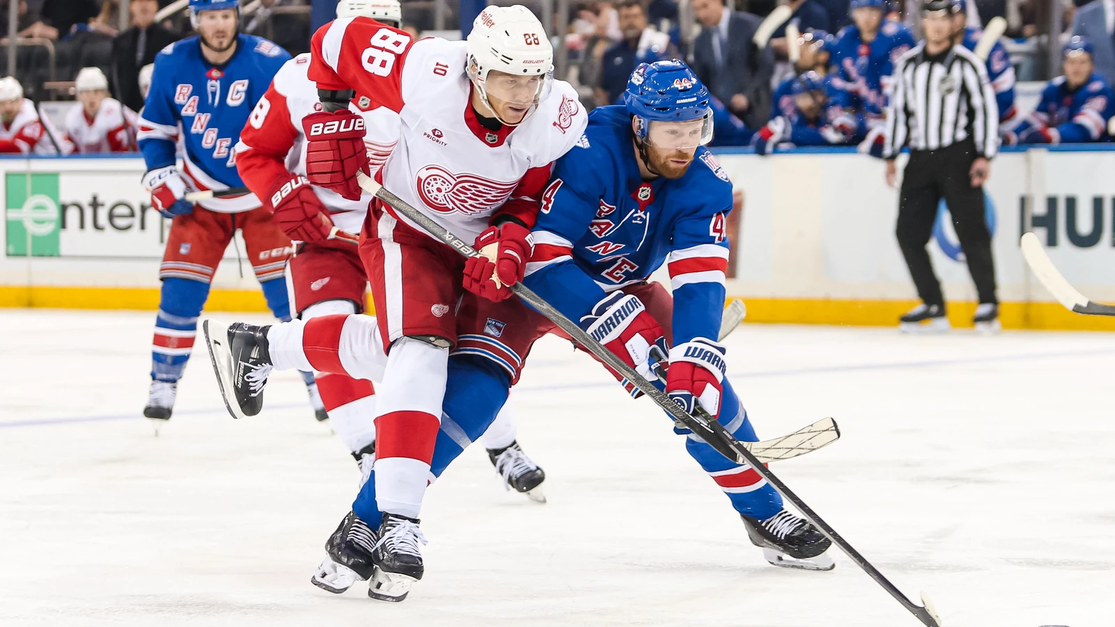 File photo: Patrick Kane, wearing a Detroit Red Wings jersey, battles a New York Rangers defender for the puck during an April 4, 2026 game in New York.