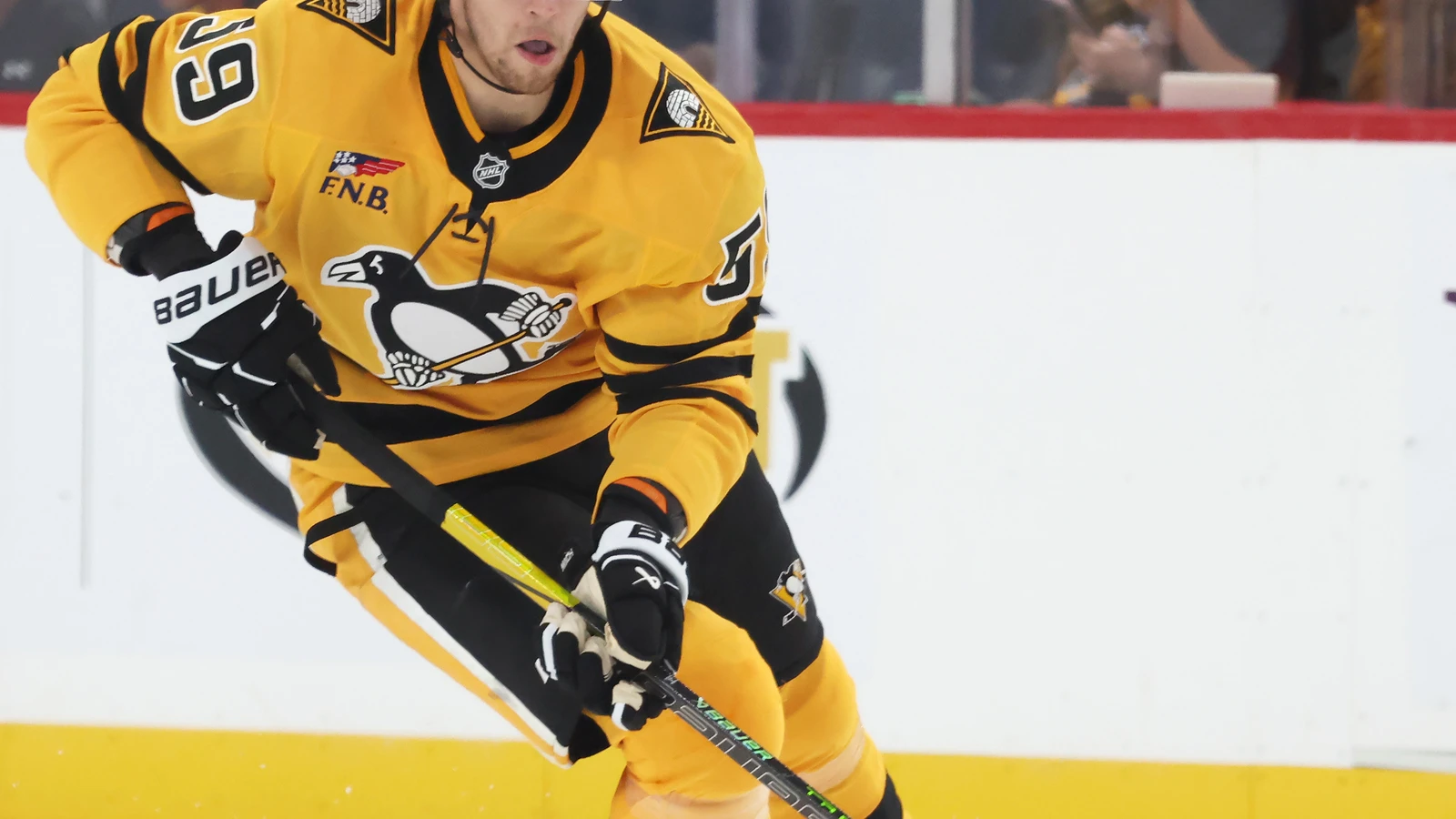 File photo: Pittsburgh Penguins winger Egor Chinakhov skates with the puck against the Dallas Stars at PPG Paints Arena.