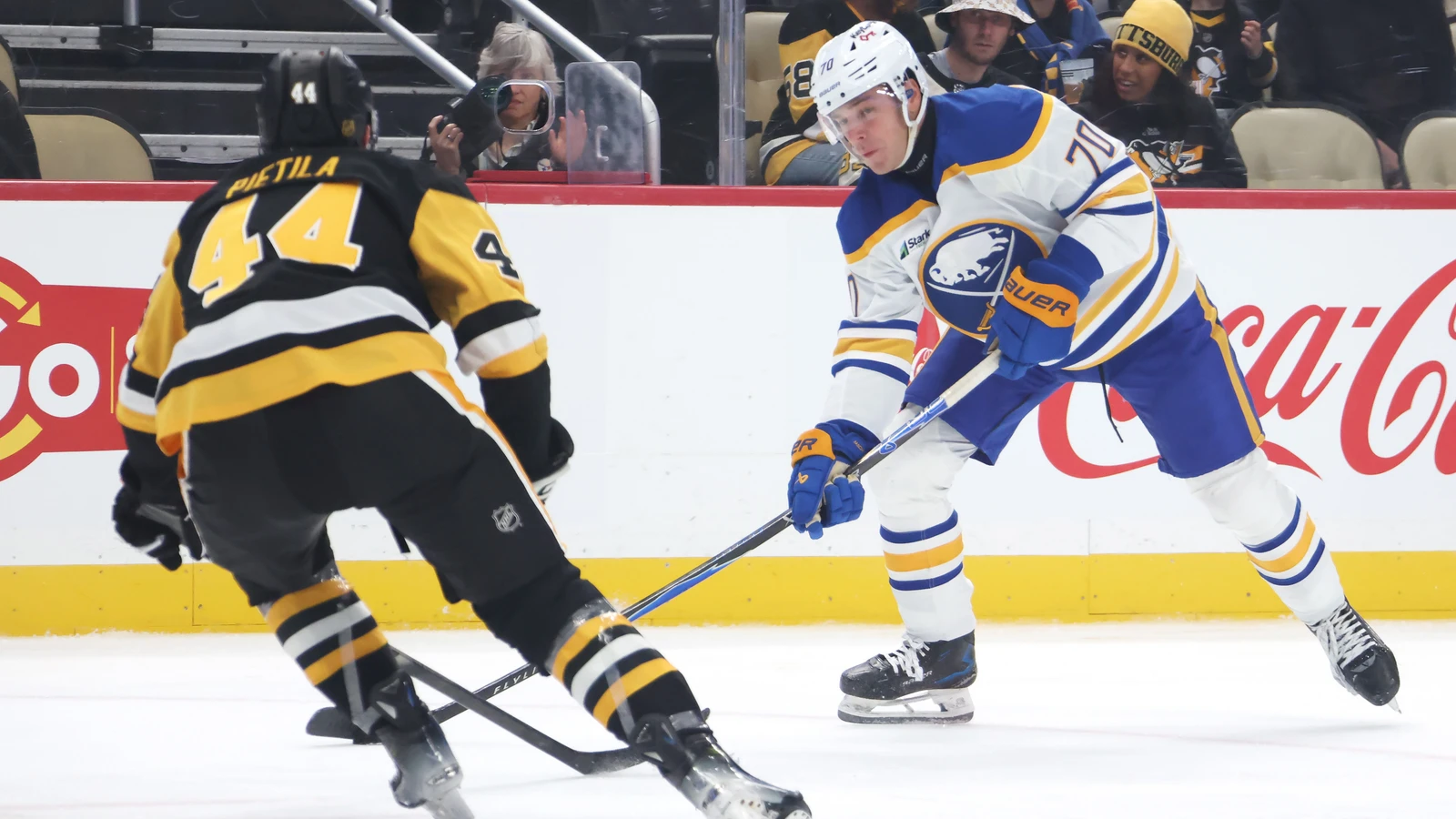 File photo: Pittsburgh Penguins defenceman Chase Pietila defends against Buffalo Sabres forward Jake Richard at PPG Paints Arena.