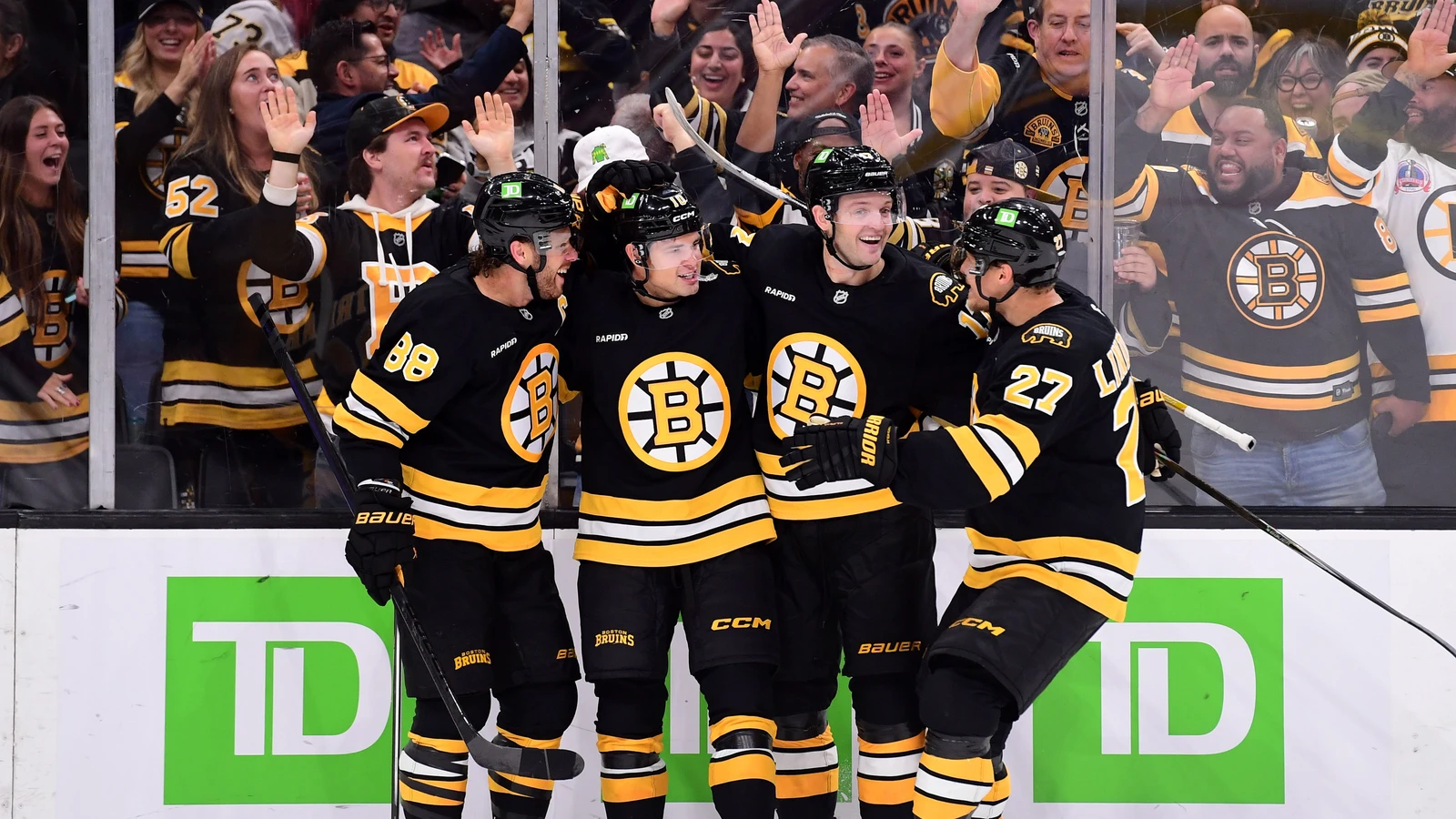 File photo: JJ Peterka celebrates a goal with Boston Bruins teammates at TD Garden.