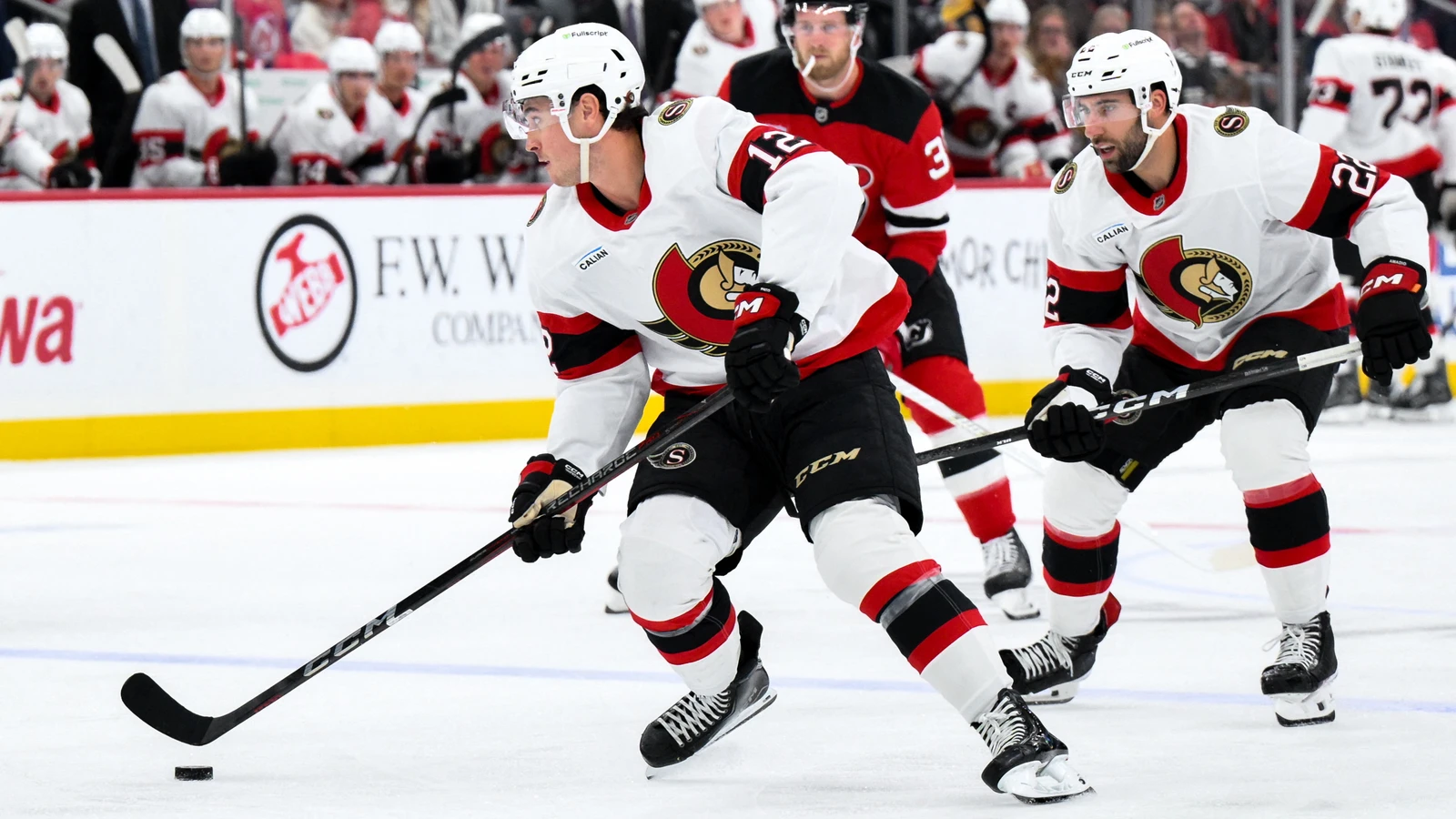 File photo: Ottawa Senators centre Shane Pinto skates with the puck against the New Jersey Devils at Prudential Center.