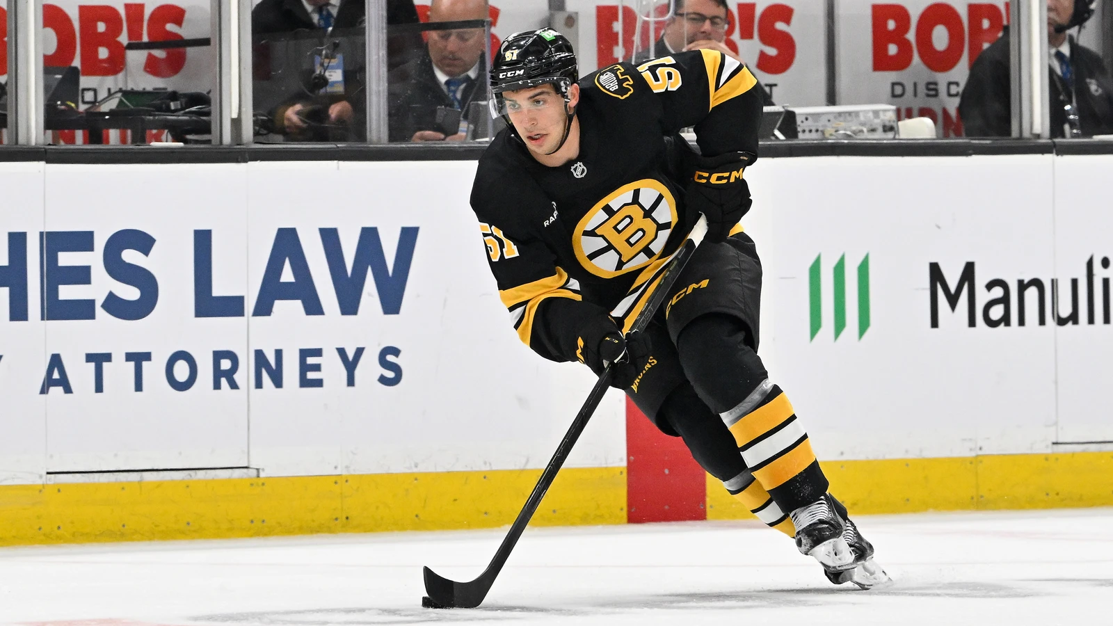 File photo: Boston Bruins centre Matthew Poitras carries the puck during a pre-season game against the Philadelphia Flyers at TD Garden on September 29, 2025.