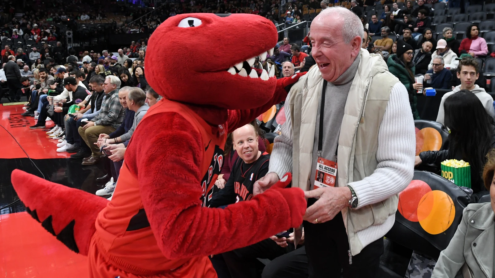 Larry Tanenbaum greets the Toronto Raptors mascot at Scotiabank Arena on December 1, 2024. File photo.