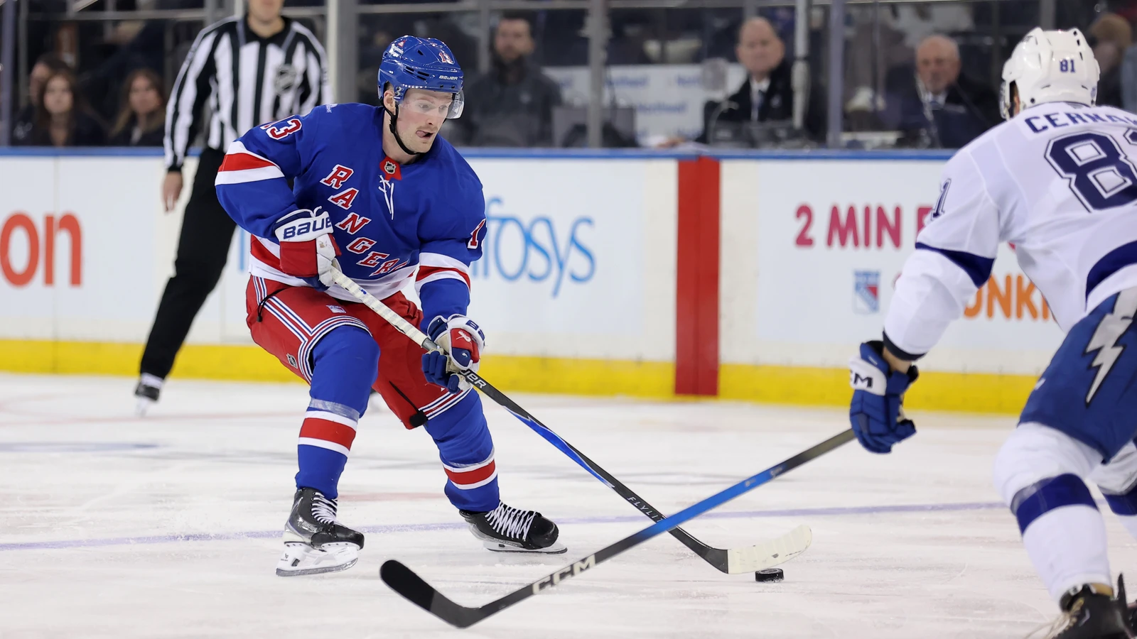 File photo: New York Rangers forward Alexis Lafrenière controls the puck against the Tampa Bay Lightning at Madison Square Garden on Oct. 13, 2026.