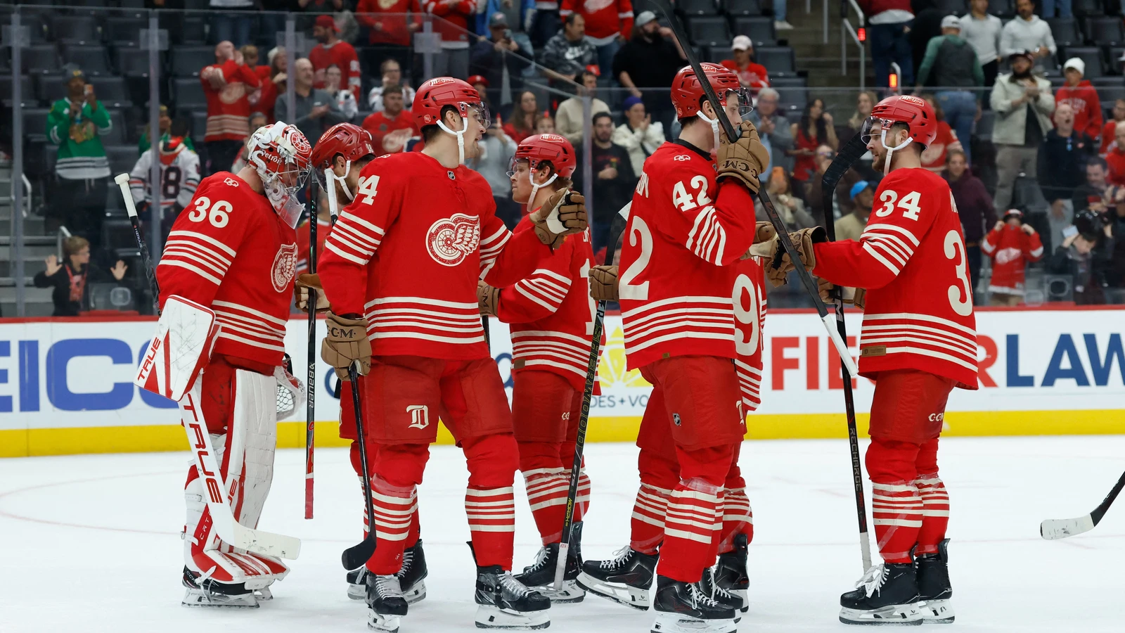 File photo: Detroit Red Wings players celebrate a victory at Little Caesars Arena.