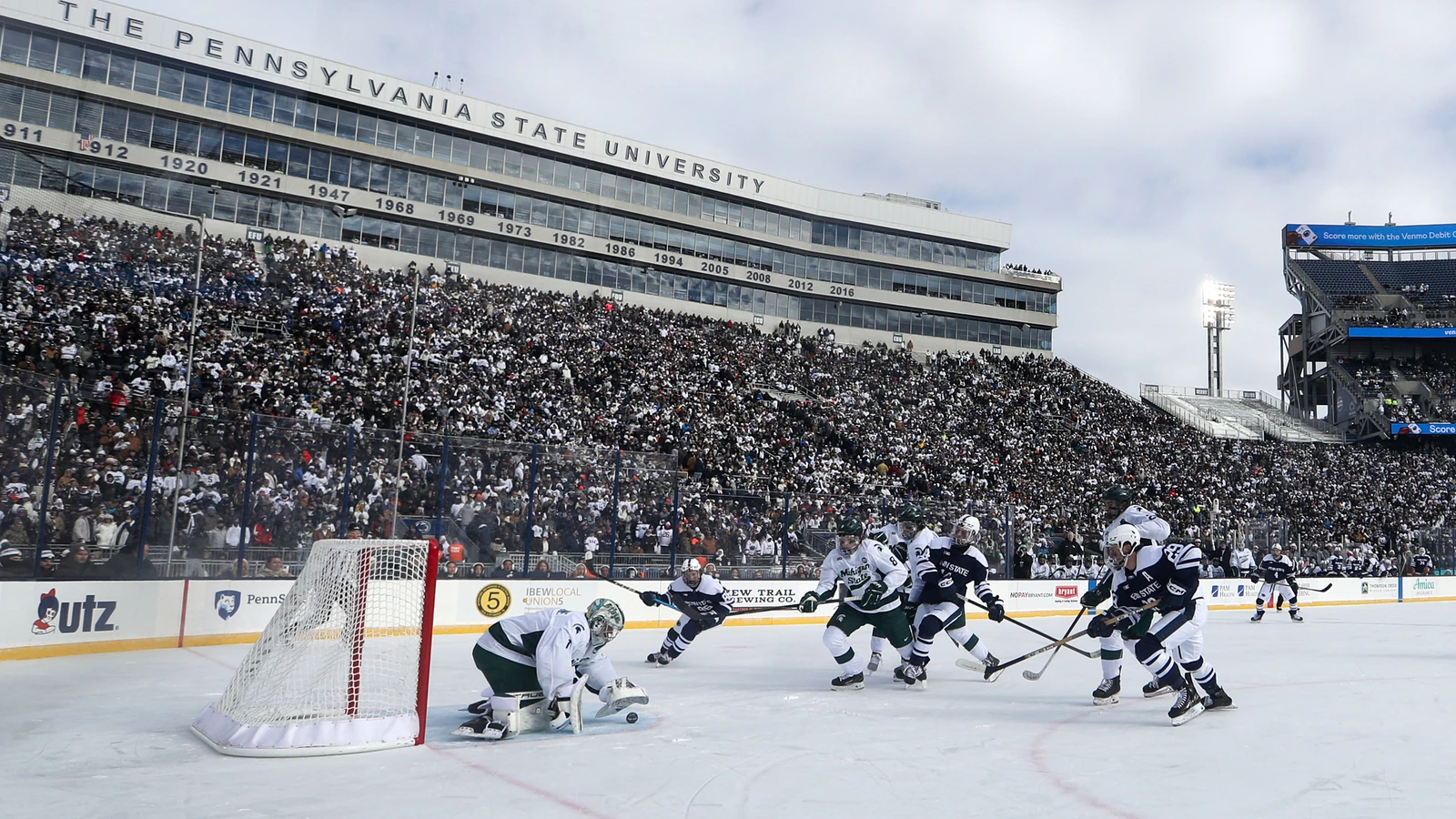 Trey Augustine makes a save for Michigan State against Penn State at Beaver Stadium on January 31, 2026. File photo.