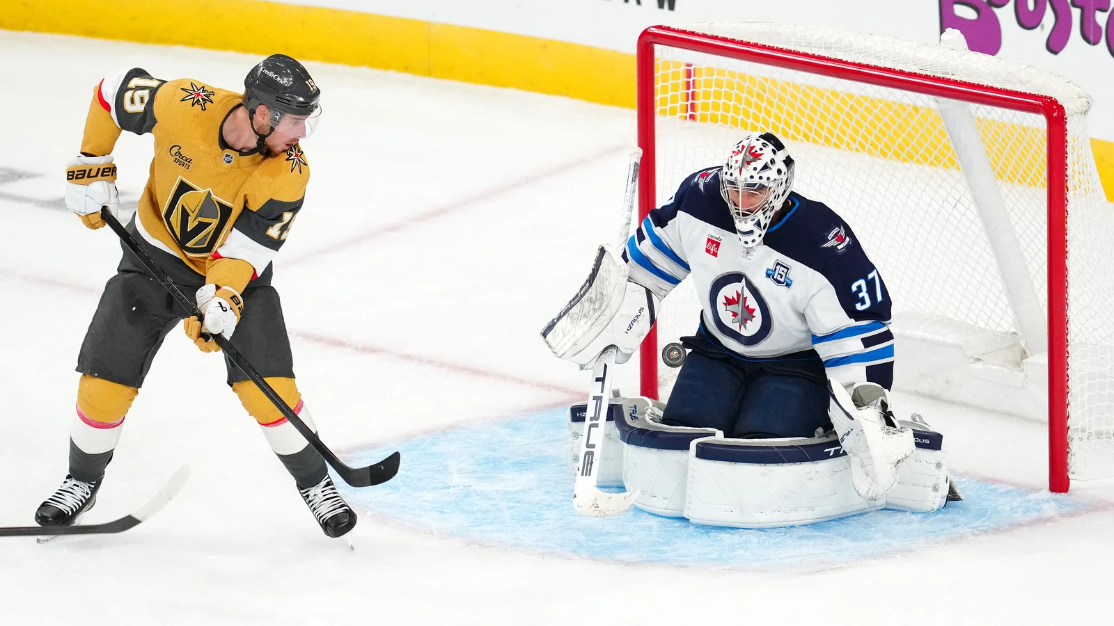 File photo: Connor Hellebuyck makes a save for the Winnipeg Jets against the Vegas Golden Knights in April 2026.