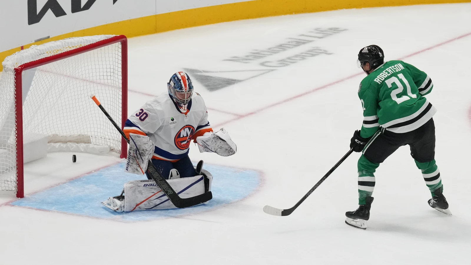 Dallas Stars left wing Jason Robertson (21) scores against New York Islanders goaltender Ilya Sorokin (30) at American Airlines Center.