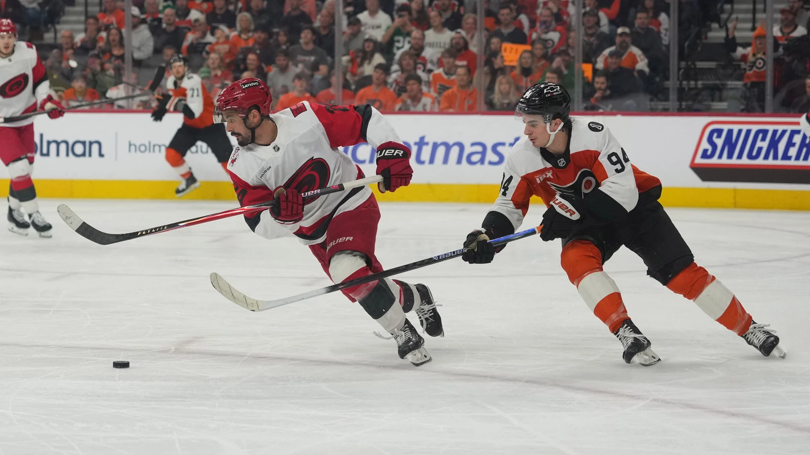 Philadelphia Flyers winger Porter Martone defends Carolina Hurricanes center Seth Jarvis during a playoff game on May 9, 2026. File photo.