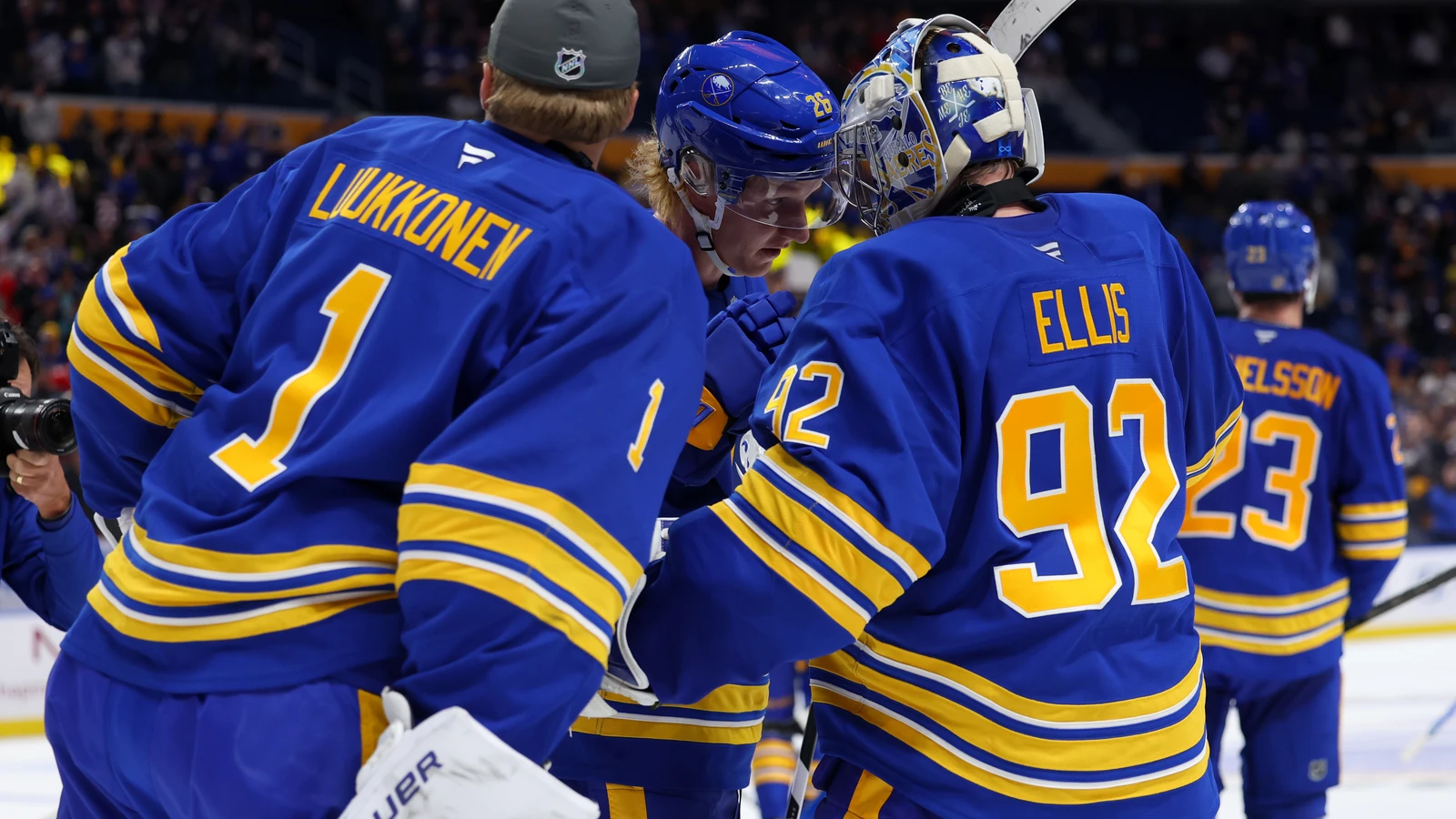 File photo: Buffalo Sabres players gather on the ice after a win at KeyBank Center.