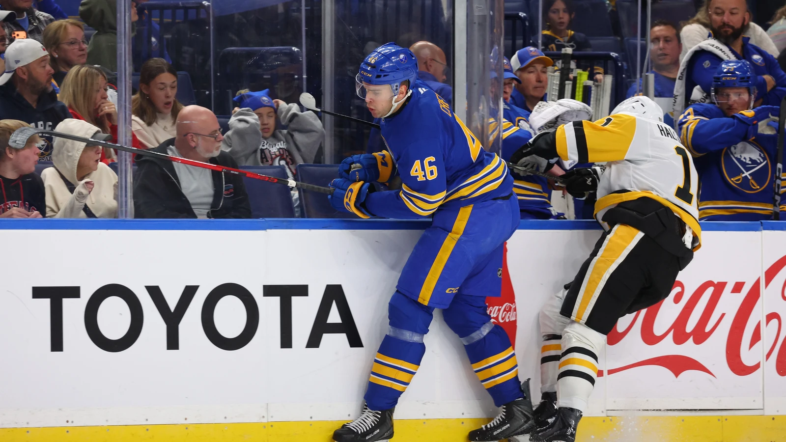 File photo: Buffalo Sabres defenceman Louis Crevier checks a Pittsburgh Penguins player along the boards at KeyBank Center on September 26, 2026.