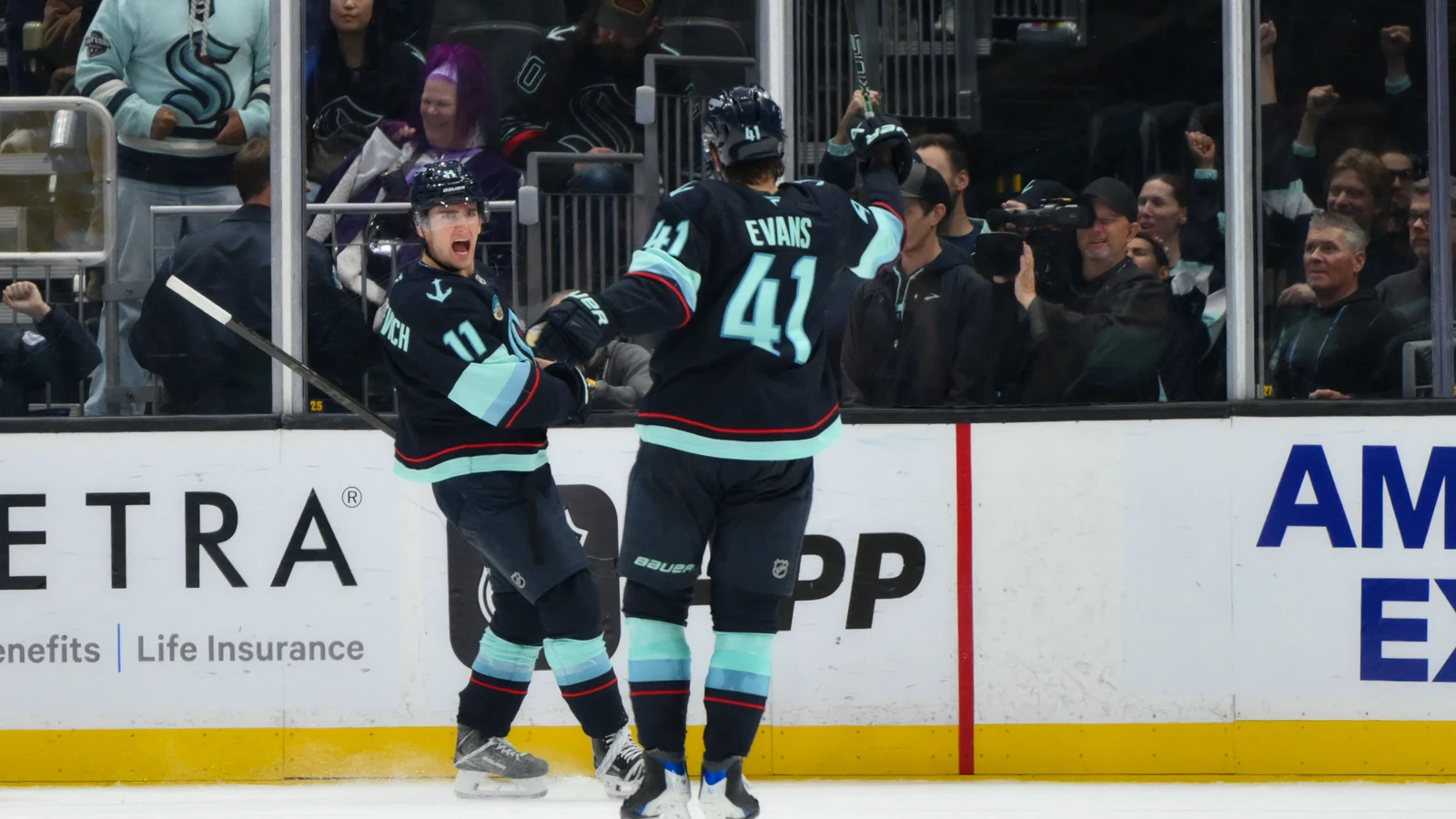 Seattle Kraken forward Mackie Samoskevich celebrates his third-period goal against the Utah Mammoth at Climate Pledge Arena.
