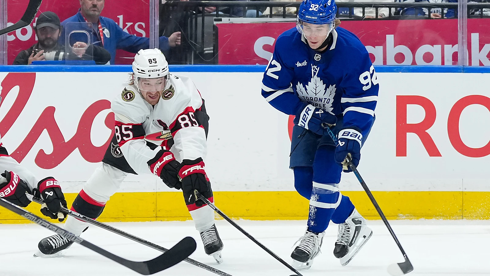 File photo: Ottawa Senators defenceman Jake Sanderson battles for the puck against the Toronto Maple Leafs at Scotiabank Arena.