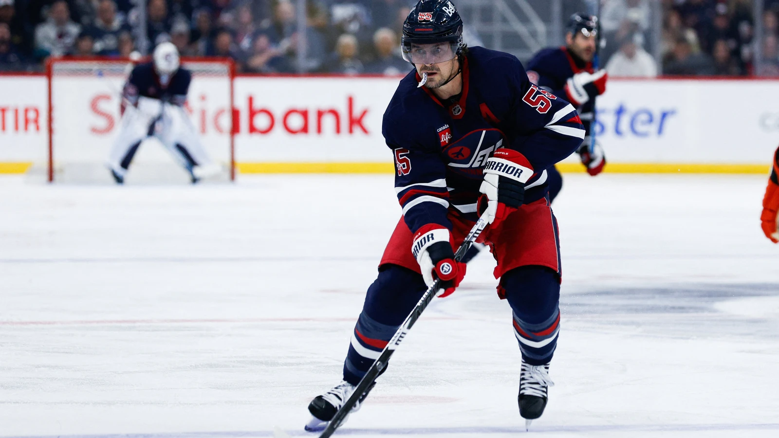 File photo: Winnipeg Jets forward Mark Scheifele skates with the puck against the Anaheim Ducks at Canada Life Centre.