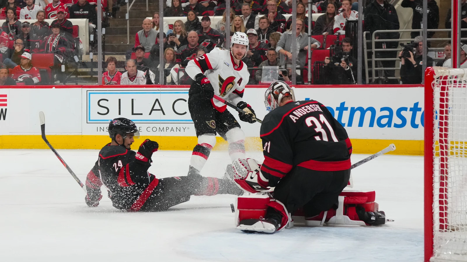 File photo: Ottawa Senators defenceman Thomas Chabot (72) shoots toward Carolina Hurricanes goaltender Frederik Andersen during an April 20, 2026 playoff game in Raleigh.