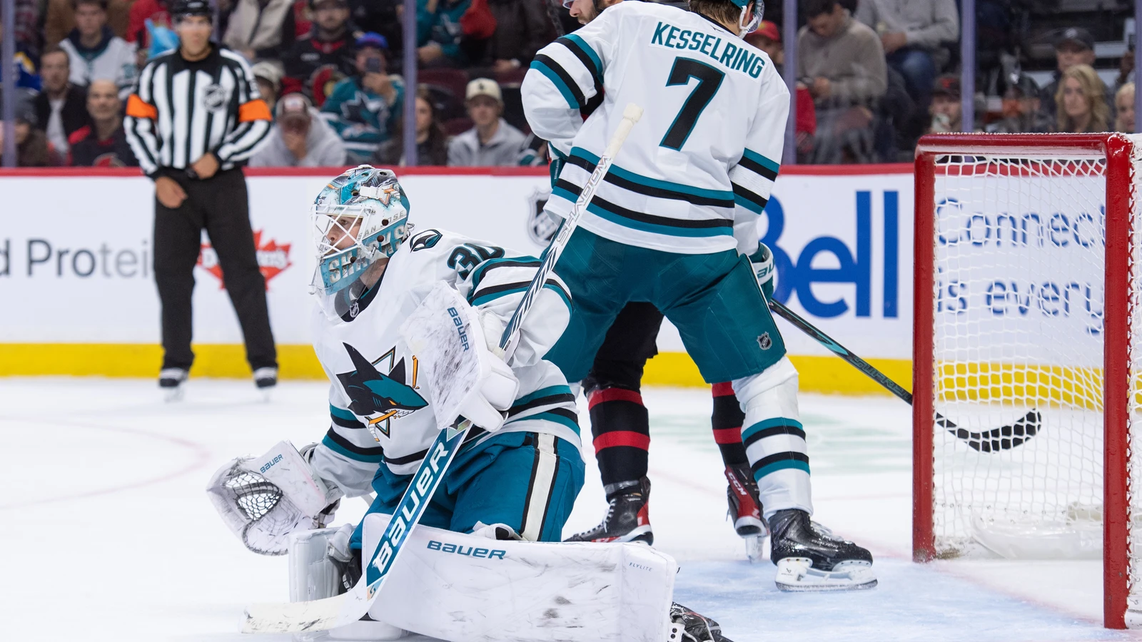 San Jose Sharks goalie Yaroslav Askarov tracks the puck during the first period against the Ottawa Senators at Canadian Tire Centre on Oct. 22, 2026.