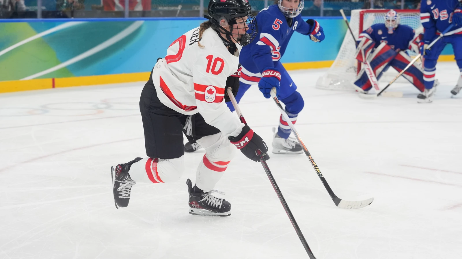 New York Sirens forward Sarah Fillier skates for Canada against the United States during the 2026 Olympic gold-medal game in Milan. Jim Midgley does not appear. File photo.