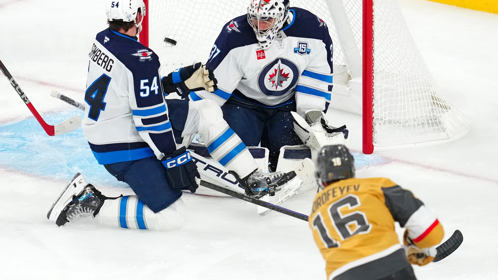 File photo: Vegas Golden Knights right wing Pavel Dorofeyev scores against Winnipeg Jets goaltender Connor Hellebuyck at T-Mobile Arena on April 13, 2026.