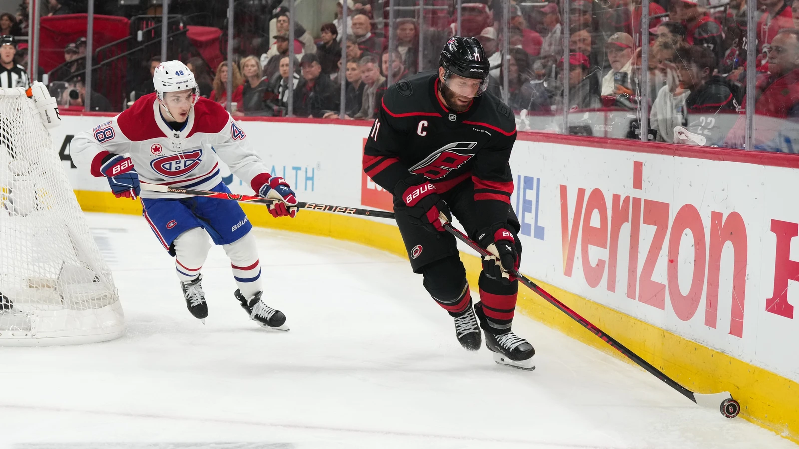 File photo: Carolina Hurricanes captain Jordan Staal, No. 11, skates with the puck against the Montreal Canadiens during a 2026 playoff game in Raleigh.