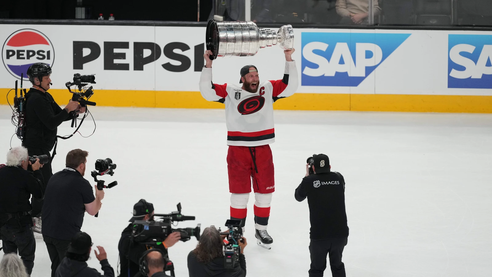 File photo: Carolina Hurricanes captain Jordan Staal raises the Stanley Cup in Las Vegas after Game 6 of the 2026 Final on June 14, 2026.
