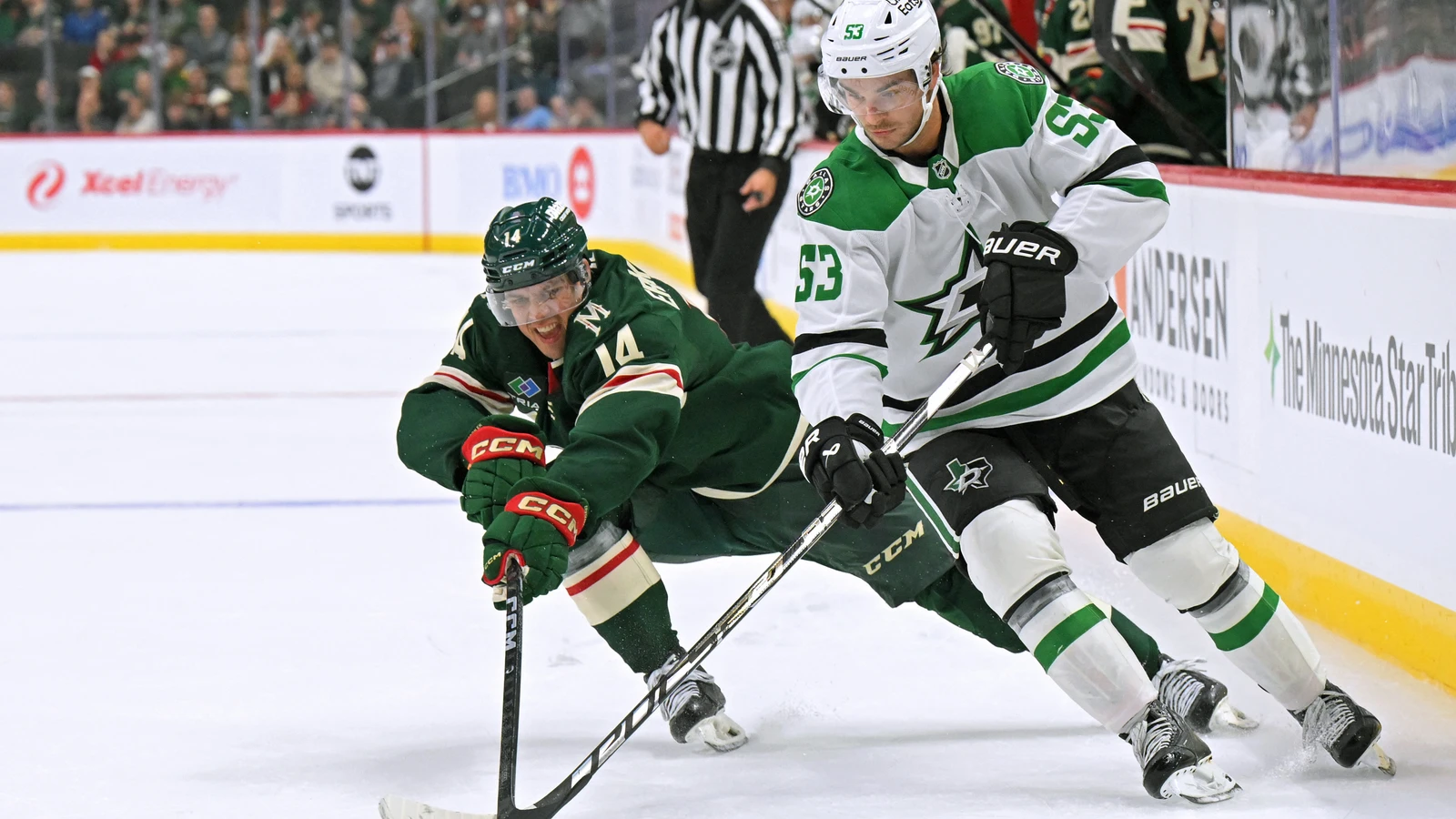 File photo: Dallas Stars forward Wyatt Johnston controls the puck as Minnesota Wild forward Joel Eriksson Ek checks him during a Sept. 25, 2026 preseason game in Saint Paul.