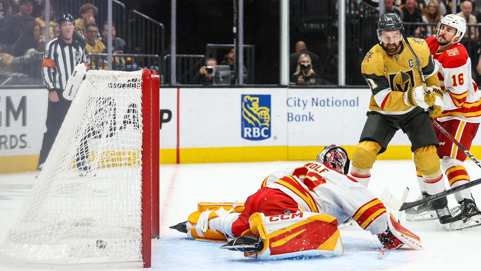 Mark Stone scores against Calgary Flames goaltender Dustin Wolf during the third period at T-Mobile Arena.