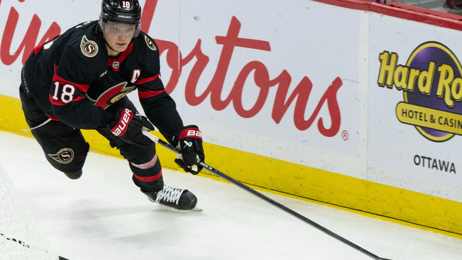 File photo: Ottawa Senators centre Tim Stützle skates with the puck against the New York Islanders at Canadian Tire Centre.