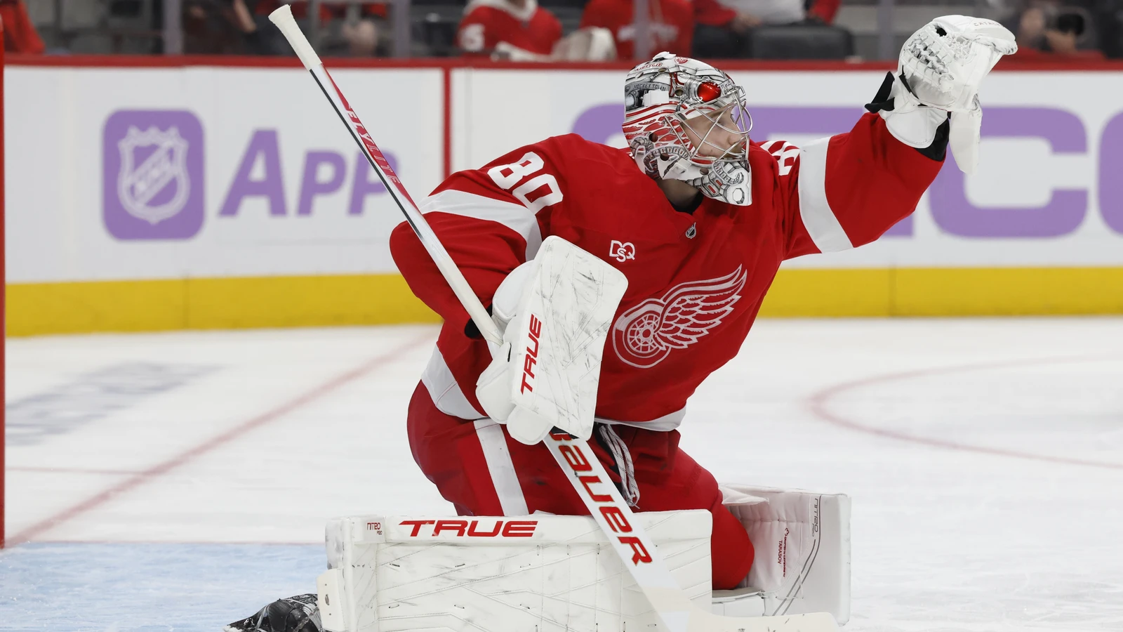 File photo: Detroit Red Wings goaltender Daniil Tarasov reaches up with his glove to make a save.