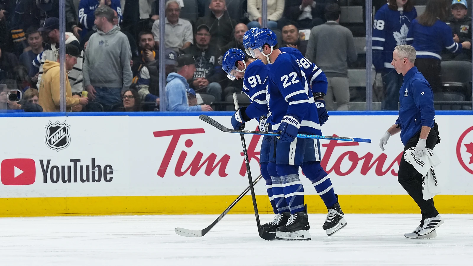 File photo: John Tavares is helped off the ice by Toronto Maple Leafs teammate Jake McCabe against the Buffalo Sabres on October 15, 2026.