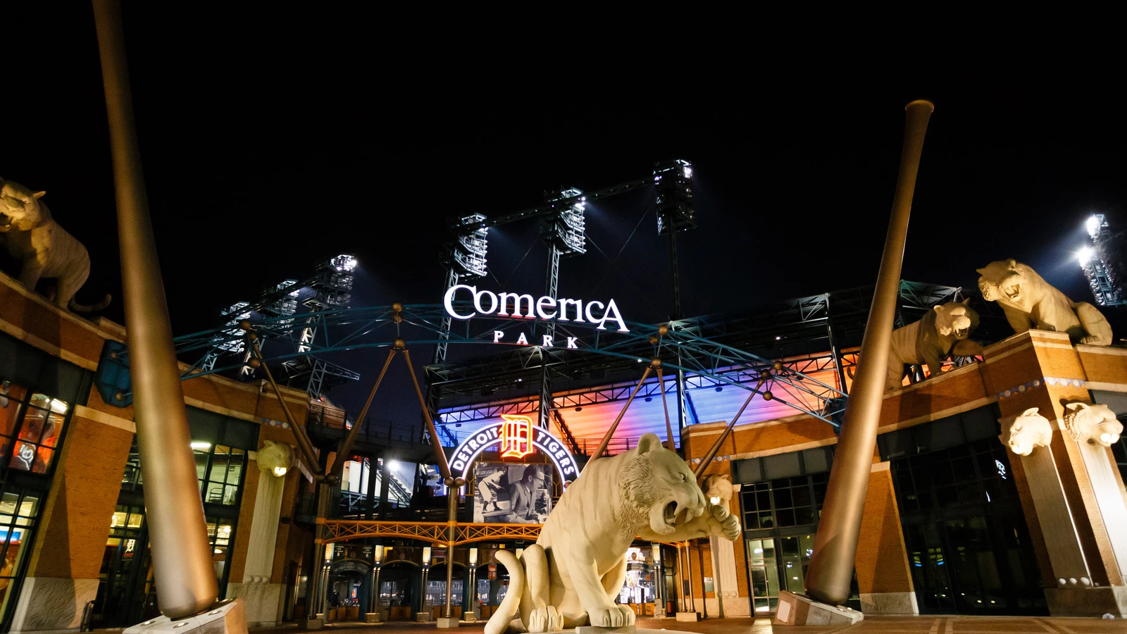 The illuminated exterior of Comerica Park, home of the Detroit Tigers, at night in Detroit. File photo from April 30, 2013; Tigers GM Jeff Greenberg is not pictured, and this does not show the Red Wings or his 2026 withdrawal.