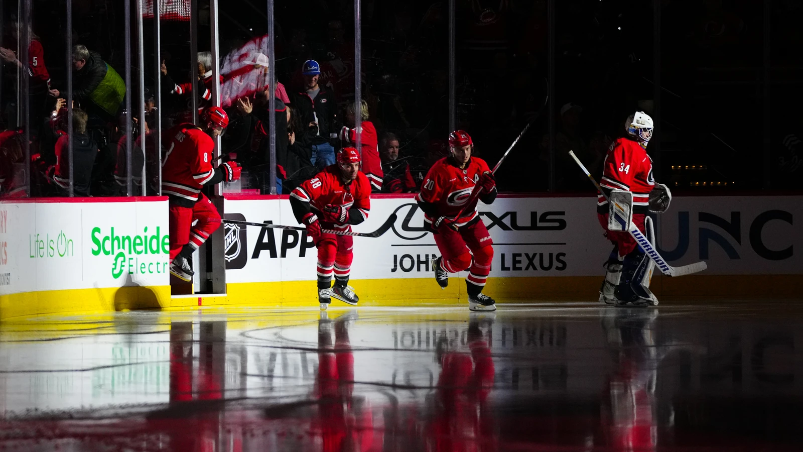 Dustin Tokarski takes the ice with Carolina teammates on December 28, 2024. File photo.