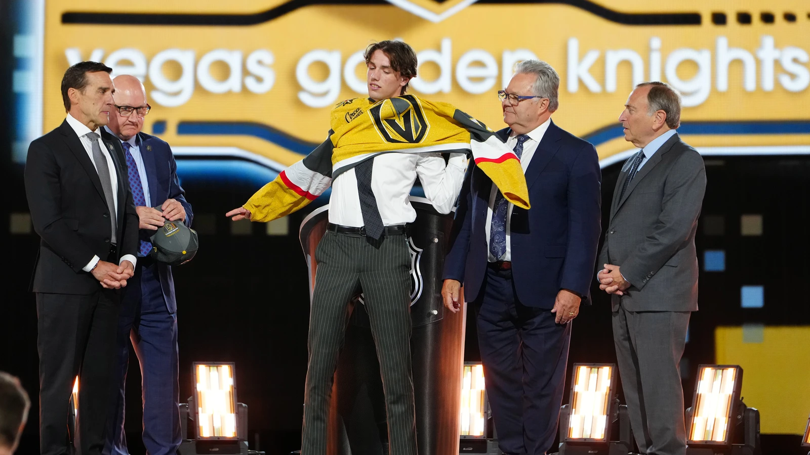File photo: Trevor Connelly puts on a Vegas Golden Knights jersey after being selected 19th overall at the 2024 NHL Draft in Las Vegas on June 28, 2024.